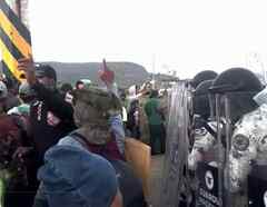Enfrentamiento de caravana migrante con Guardia Nacional en México