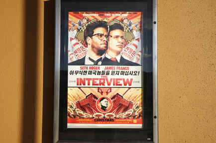 The poster for the film &quot;The Interview&quot; is seen outside the Alamo Drafthouse theater in Littleton