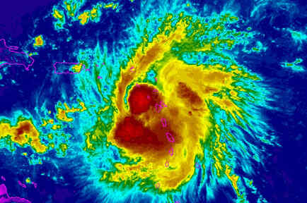 Tropical Storm Erika is seen in the Caribbean Ocean in a NOAA GOES-East enhanced satellite image