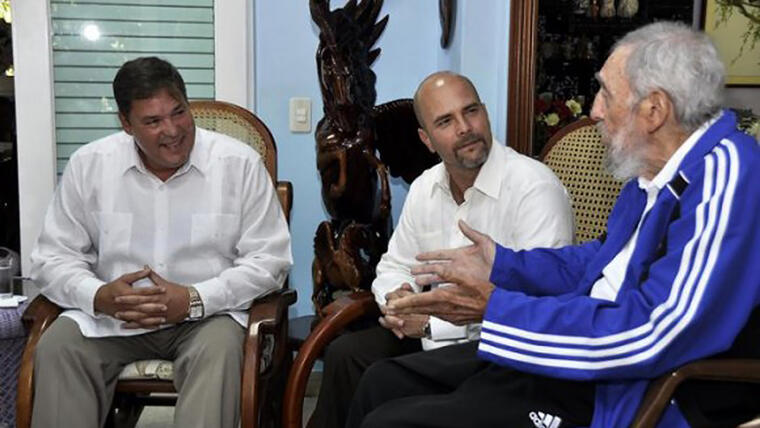 Cuba's former President Fidel Castro sits with Labanino and Hernandez, two of the "Cuban Five", in Havana