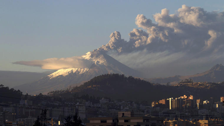 The Cotopaxi volcano, one of the world's most active volcanoes, spews ash and smoke as seen from Quito