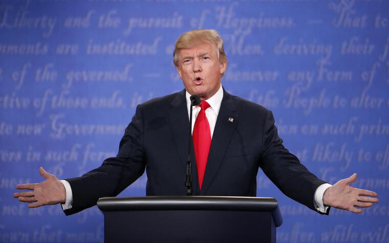 Republican U.S. presidential nominee Trump speaks during the third and final debate with Democratic nominee Clinton in Las Vegas
