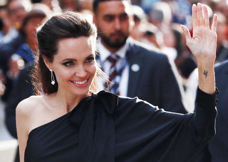 Jolie arrives on the red carpet for the film "First They Killed My Father" during the Toronto International Film Festival in Toronto