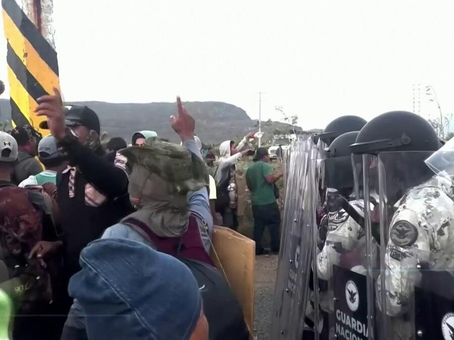 Enfrentamiento de caravana migrante con Guardia Nacional en México