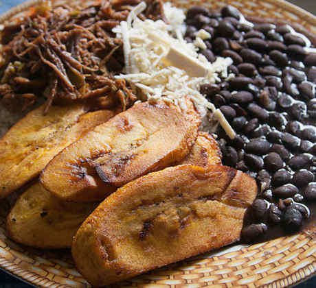 Venezuelan cuisine: Pabellón Criollo, Rice, Shredded beef, fried plantain, and stewed black beans